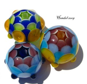 Why are they called 'Birthday Beads?' Because I made them on my birthday a few years ago and can't bear to part with them. And for some reason, they make me think of the circus.